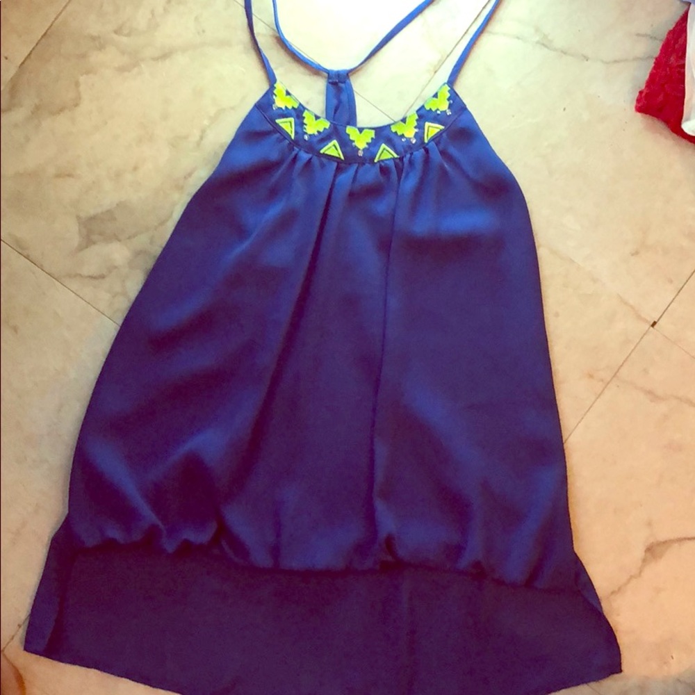 Blue blouse with green design